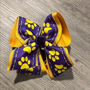 Purple and Yellow Paw Print Hair Bow
